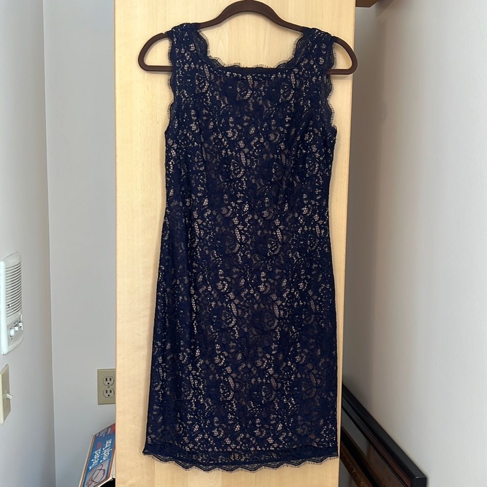 Navy blue lace dress.  Sleeveless with full zipper back. So cute on!